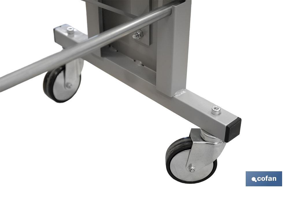EXPOSITOR DE HULES Y MANTELES HORIZONTAL CON CORTADOR Y RUEDAS PARA 22 ROLLOS