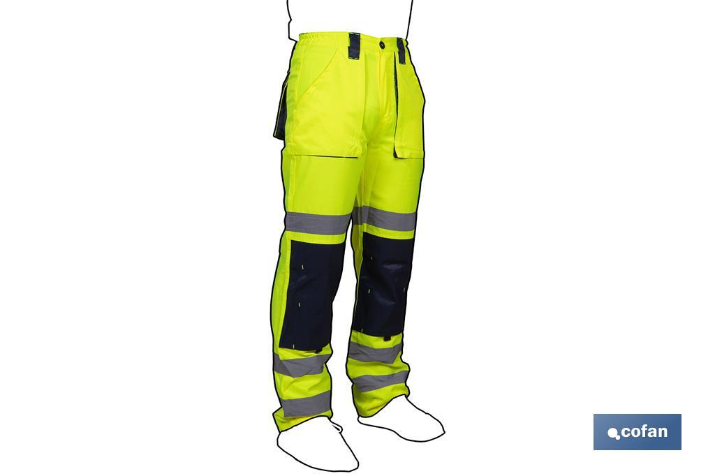 PANTALÓN DE ALTA VISIBILIDAD MODELO SIRIO AMARILLO Y AZUL MARINO TALLA XXL